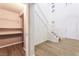 Bright entryway features a staircase, tiled floors, and a doorway to a walk-in closet at 5568 Table Top Ln, Las Vegas, NV 89135