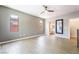 Large main bedroom with wood floors, natural light, and entry to ensuite bathroom at 5568 Table Top Ln, Las Vegas, NV 89135