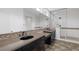 Modern bathroom with double sink vanity and glass enclosed shower at 5625 Galivan Vista St, North Las Vegas, NV 89081
