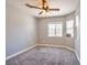 Bedroom with carpeted floors, ceiling fan, and good natural light at 5732 Hornbrook St, North Las Vegas, NV 89031