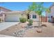 Charming single-Gathering home with a well-maintained yard and a two-car garage, showcasing curb appeal at 5732 Hornbrook St, North Las Vegas, NV 89031