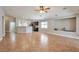 Expansive living room features tile flooring, recessed lighting, and an open floor plan at 5732 Hornbrook St, North Las Vegas, NV 89031