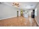 Expansive living room with lots of natural light. Tile flooring throughout at 5732 Hornbrook St, North Las Vegas, NV 89031