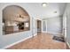 Open-concept living room with view into kitchen, great for entertaining at 5732 Hornbrook St, North Las Vegas, NV 89031