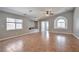 Bright, airy living room boasts tile floors, recessed lighting, and expansive windows at 5732 Hornbrook St, North Las Vegas, NV 89031