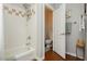 Bright bathroom featuring a shower-tub combination and a separate toilet room at 6617 Golden Bit Ave, Las Vegas, NV 89131