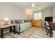 Bright bedroom featuring a daybed with a decorative rug and coordinated decor at 6617 Golden Bit Ave, Las Vegas, NV 89131
