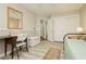 Bedroom offering comfort with a daybed, mirrored wall decor, and stylish accents at 6617 Golden Bit Ave, Las Vegas, NV 89131