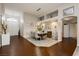 Inviting dining area with elegant decor, stylish lighting, and a spacious layout perfect for entertaining guests at 6617 Golden Bit Ave, Las Vegas, NV 89131