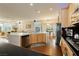 Spacious open-concept kitchen featuring modern appliances and a seamless flow to the living areas at 6617 Golden Bit Ave, Las Vegas, NV 89131