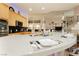 Spacious kitchen featuring stainless steel appliances, granite countertops, and an island with seating at 6617 Golden Bit Ave, Las Vegas, NV 89131