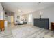 Bright main bedroom with hardwood floors, large windows, and a comfortable layout at 6617 Golden Bit Ave, Las Vegas, NV 89131
