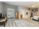 Large main bedroom with hardwood floors, high ceilings, and bright, natural light at 6617 Golden Bit Ave, Las Vegas, NV 89131