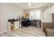 Bright office space with a built-in desk, organized storage, and a shuttered window at 6617 Golden Bit Ave, Las Vegas, NV 89131
