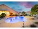 Inviting pool and spa area with desert landscaping, perfect for outdoor relaxation at 6617 Golden Bit Ave, Las Vegas, NV 89131