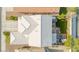 Aerial view of the home showcasing the roof, backyard with artificial turf and outdoor living spaces at 7032 Wonderberry St, Las Vegas, NV 89131