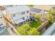 Overhead shot of the backyard with a covered patio, artificial turf and outdoor seating areas, great for gatherings at 7032 Wonderberry St, Las Vegas, NV 89131