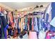 Walk-in closet featuring ample storage with clothing racks and shelves at 7032 Wonderberry St, Las Vegas, NV 89131