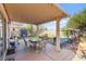 Inviting covered patio featuring outdoor seating perfect for entertaining friends and Gathering in comfort at 7032 Wonderberry St, Las Vegas, NV 89131