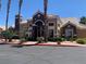 The clubhouse exterior shows a modern design with desert themed landscaping at 8101 W Flamingo Rd # 1102, Las Vegas, NV 89147