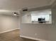Open-concept kitchen with updated appliances and a breakfast bar at 8101 W Flamingo Rd # 1102, Las Vegas, NV 89147