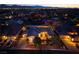 Aerial view of the home at dusk, highlighting the well-manicured landscaping and neighborhood at 8149 Villa De La Playa St, Las Vegas, NV 89131