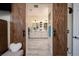 View from main bedroom to bathroom showcases barn door at 8149 Villa De La Playa St, Las Vegas, NV 89131
