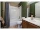 Updated bathroom with neutral palette, shower-tub combo, and updated vanity at 8149 Villa De La Playa St, Las Vegas, NV 89131