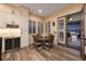 Cozy dining area with natural light and access to outdoor kitchen and patio space at 8149 Villa De La Playa St, Las Vegas, NV 89131