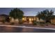 Well-maintained single-story home showcasing manicured landscaping, attractive exterior lighting, and inviting curb appeal at 8149 Villa De La Playa St, Las Vegas, NV 89131