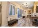Inviting foyer showcases decorative glass doors and a seating bench at 8149 Villa De La Playa St, Las Vegas, NV 89131