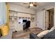 A home office featuring custom built-ins and a rolling library ladder at 8149 Villa De La Playa St, Las Vegas, NV 89131