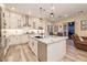 Bright and modern kitchen with granite countertops, stainless steel appliances, and ample cabinet space at 8149 Villa De La Playa St, Las Vegas, NV 89131