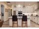 The gourmet kitchen features a large island, updated appliances, and ample counter space at 8149 Villa De La Playa St, Las Vegas, NV 89131