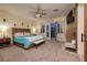 Serene main bedroom has backyard access and a ceiling fan at 8149 Villa De La Playa St, Las Vegas, NV 89131