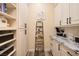 Walk-in pantry with custom shelving and plenty of storage space at 8149 Villa De La Playa St, Las Vegas, NV 89131
