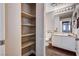 Bathroom featuring open shelving, vanity with drawers, a sink, and a toilet at 8600 W Charleston Blvd # 1059, Las Vegas, NV 89117