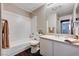 Bathroom featuring a shower and bathtub, vanity with sink and drawers, and a toilet at 8600 W Charleston Blvd # 1059, Las Vegas, NV 89117