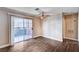 Bright bedroom with sliding glass door access to patio and wood flooring at 8600 W Charleston Blvd # 1059, Las Vegas, NV 89117