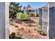 Lush landscaped community grounds with rock features, bushes, and vibrant trees, promoting outdoor enjoyment at 8600 W Charleston Blvd # 1059, Las Vegas, NV 89117