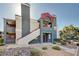 Beautiful apartment complex with well-maintained landscaping and updated exterior paint at 8600 W Charleston Blvd # 1059, Las Vegas, NV 89117