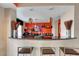 Stylish kitchen bar area with granite countertop and contemporary pendant lighting fixtures at 8600 W Charleston Blvd # 1059, Las Vegas, NV 89117