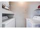 Practical laundry area with a washer, a dryer, and extra storage space for convenience and organization at 8600 W Charleston Blvd # 1059, Las Vegas, NV 89117