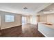 Open concept living room with view of kitchen, stainless steel sink and wood floor at 8600 W Charleston Blvd # 1059, Las Vegas, NV 89117