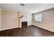 Living room showcasing a fireplace, neutral walls, and hardwood floors at 8600 W Charleston Blvd # 1059, Las Vegas, NV 89117