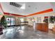 Inviting lobby area with stone floors, wood reception desk, and comfortable seating at 8600 W Charleston Blvd # 1059, Las Vegas, NV 89117