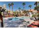 Relaxing community pool with lounge chairs and lush landscaping, offering a refreshing outdoor escape for residents at 8600 W Charleston Blvd # 1059, Las Vegas, NV 89117
