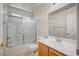 Bathroom with tub/shower combo and a single vanity with a mirror and light at 8768 Tom Noon Ave # 101, Las Vegas, NV 89178