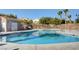 Sparkling community pool with clear blue water, surrounded by a well-maintained deck and comfortable seating at 8768 Tom Noon Ave # 101, Las Vegas, NV 89178