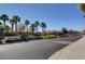 Community entrance sign with lush landscaping, providing a welcoming and upscale impression at 8768 Tom Noon Ave # 101, Las Vegas, NV 89178